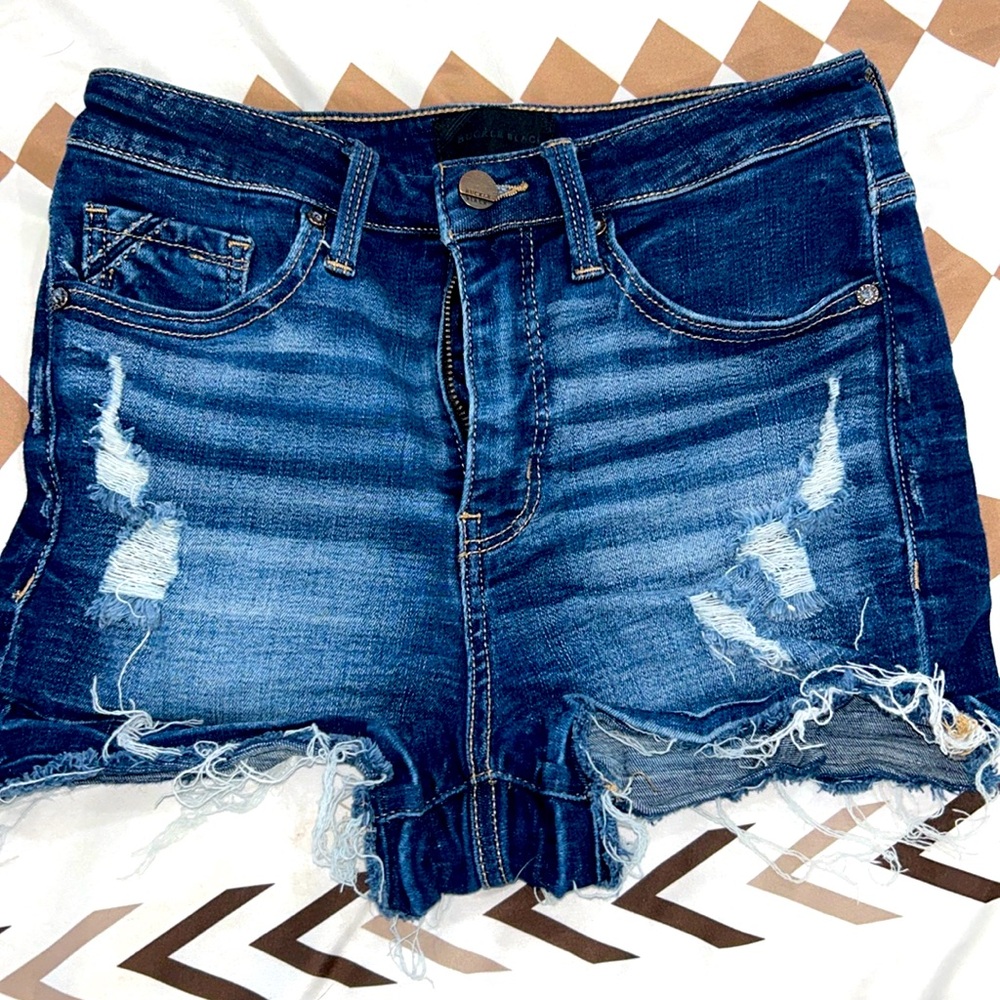 Buckle black jean short, stretchy with rips.